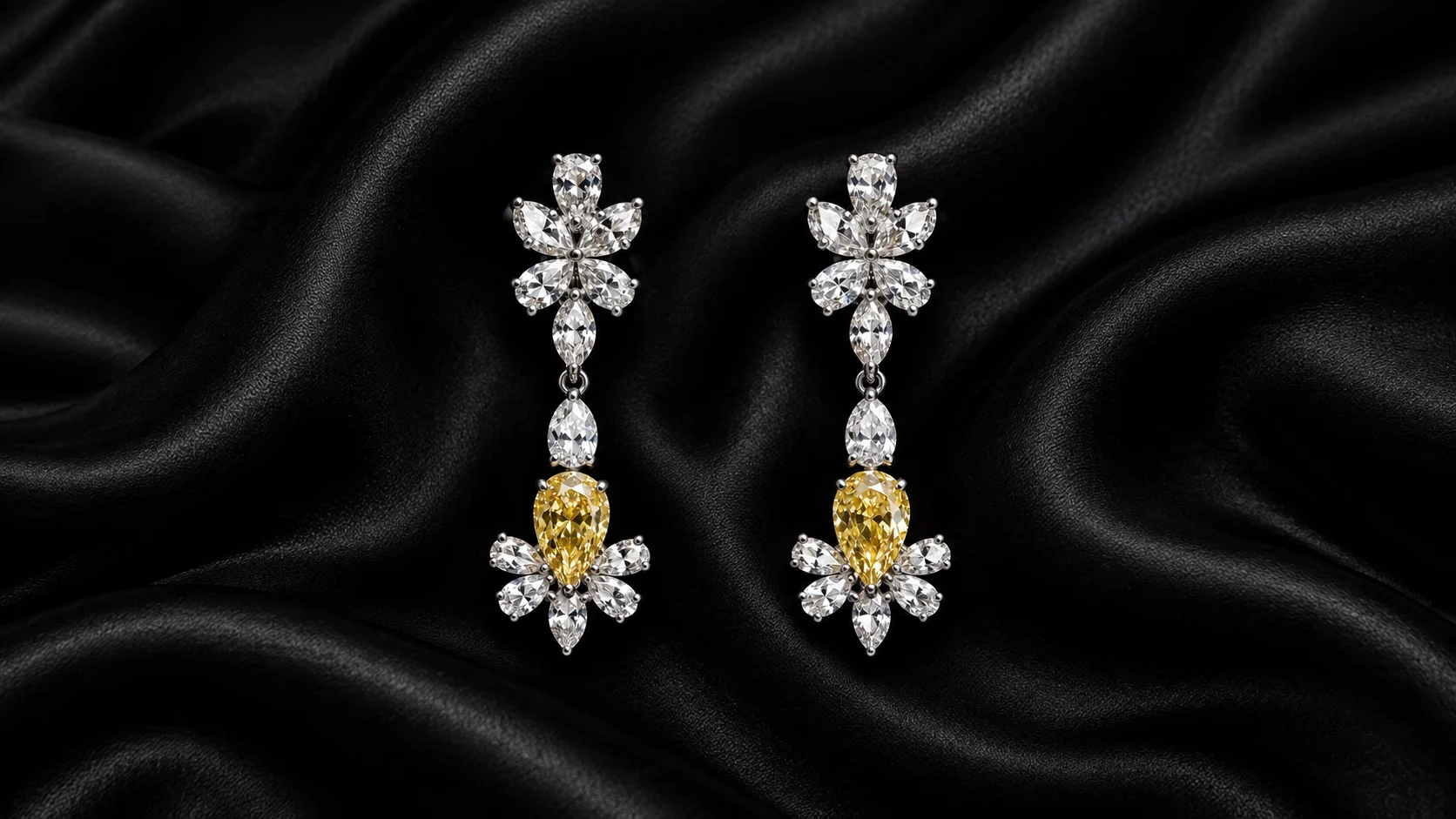 Canary Bloom diamond drop earrings on black silk